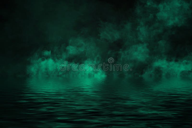 Coastal fog . Green smoke on the shore . Water reflection