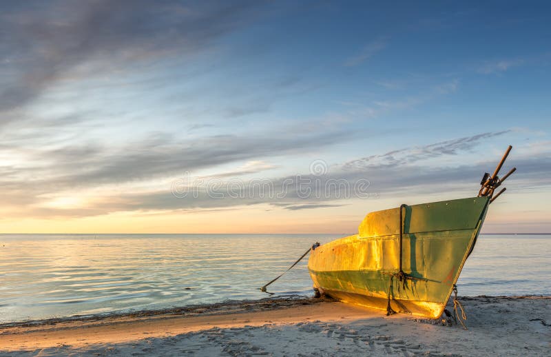 Coastal landscape with lonely fishing boat, Baltic Sea, Europe