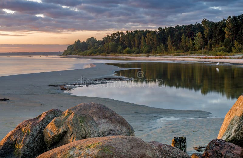 Coastal landscape with old broken pier, Baltic Sea