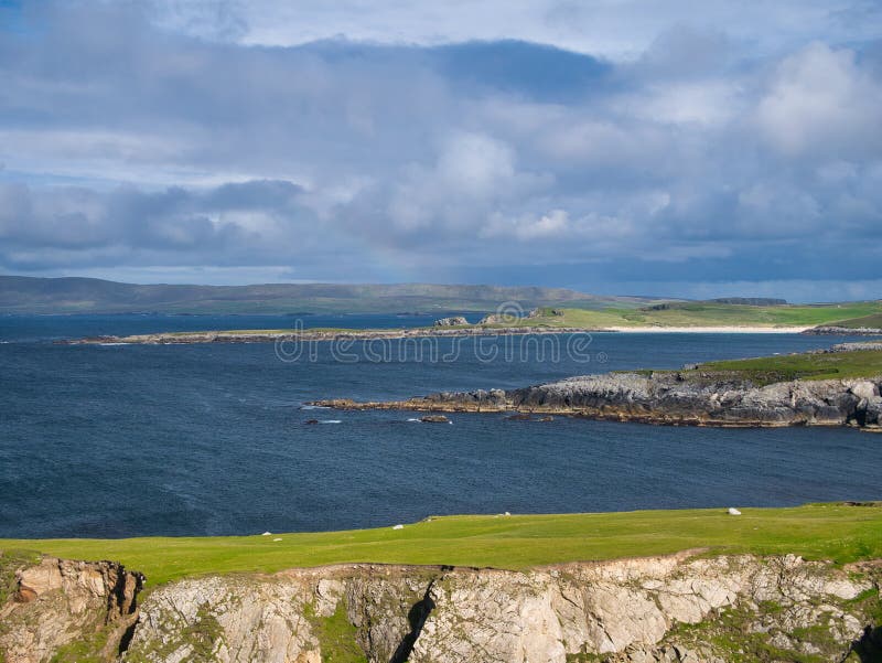 Coastal scenery of the Wick of Breckon and the Ness of Houlland near Breckon on the north coast of the island of Yell in Shetland