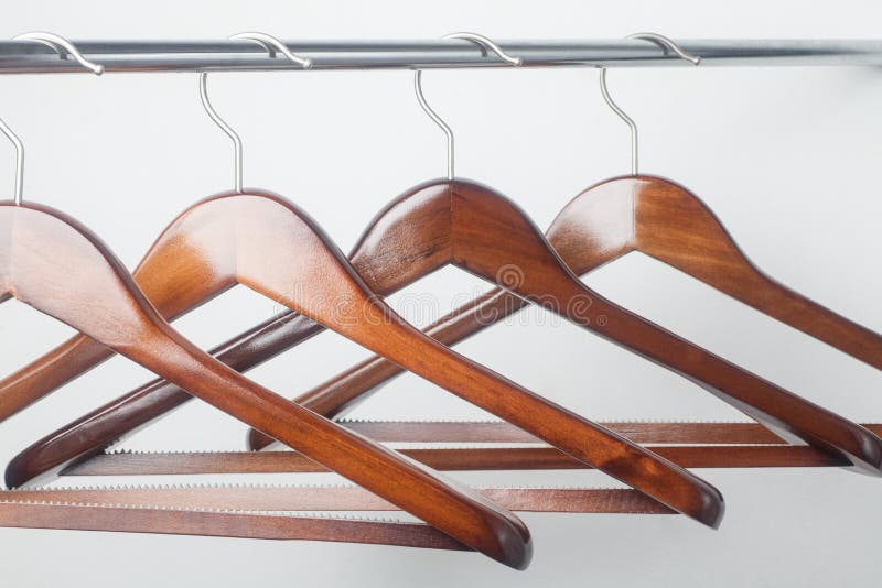 Single empty coat hanger stock photo. Image of laundry 27497186