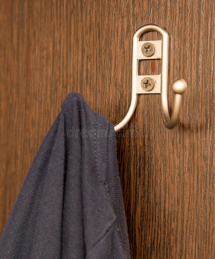 Coat hook in the closet stock image. Image of disabled 108899551