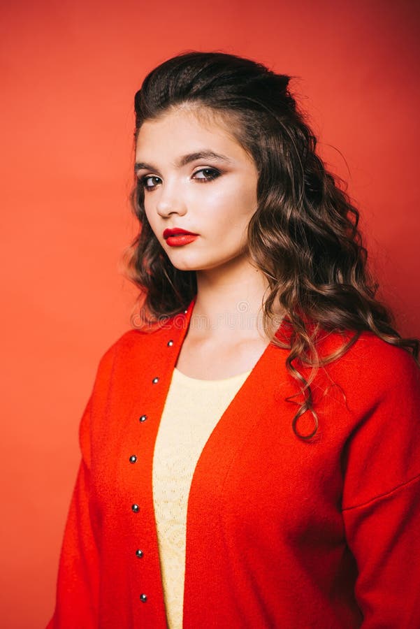 A coat works for anywhere. Young woman look trendy. Fashion girl wear cute cardigan. Fashionable look of vogue model royalty free stock image A coat works for anywhere. Young woman look trendy. Fashion girl wear cute cardigan. Fashionable look of vogue model royalty free stock image
