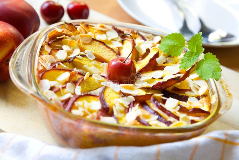 Cobbler in a casserole with nectarines and cherries. Cobbler in a casserole with nectarines and cherries.