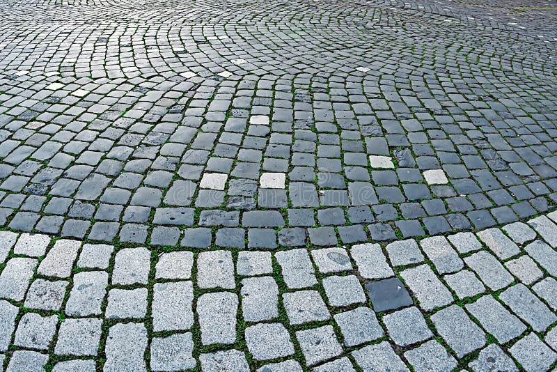 Cobblestone sidewalk made of cubic stones 2