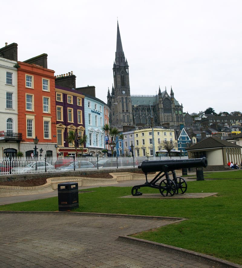 Colourful Cobh buildings, cannon and Cathedral Spire, Cobh, Ireland