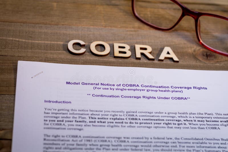 COBRA Healthcare Insurance Benefits for Unemployment concept.  COBRA letters spelled out to review healthcare coverage.