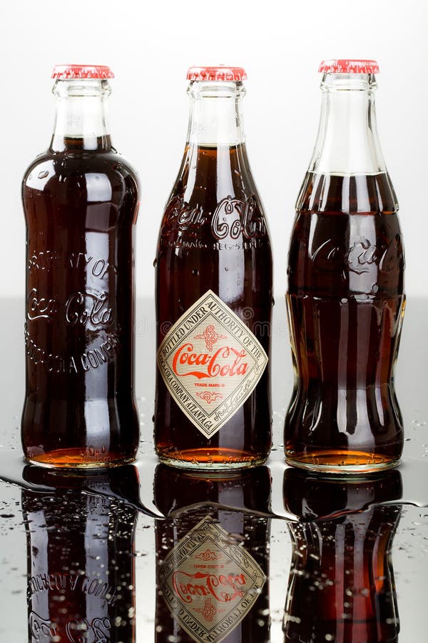 Coca - colaflaska arkivbilder