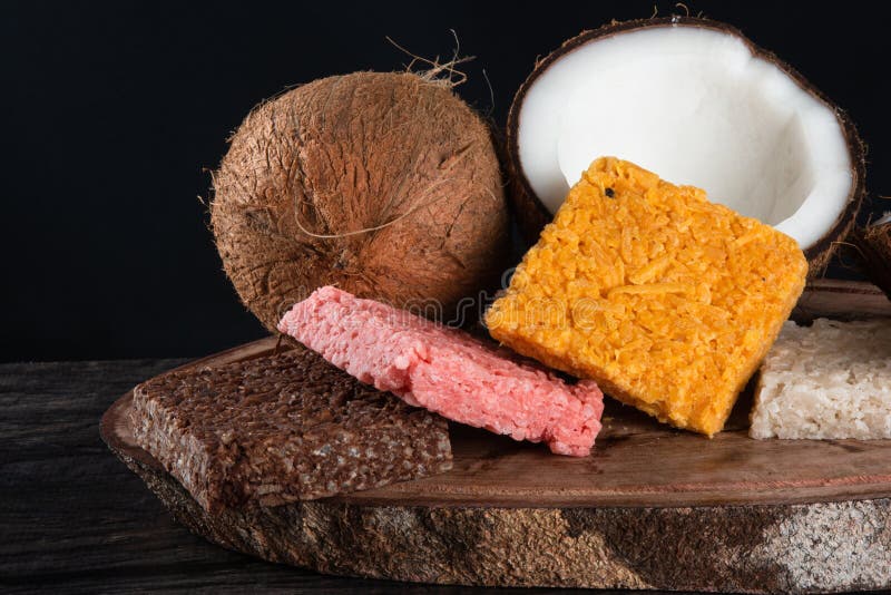 Cocada Coconut Candy, Sweet Brazilian in Rustic Wood Background Stock