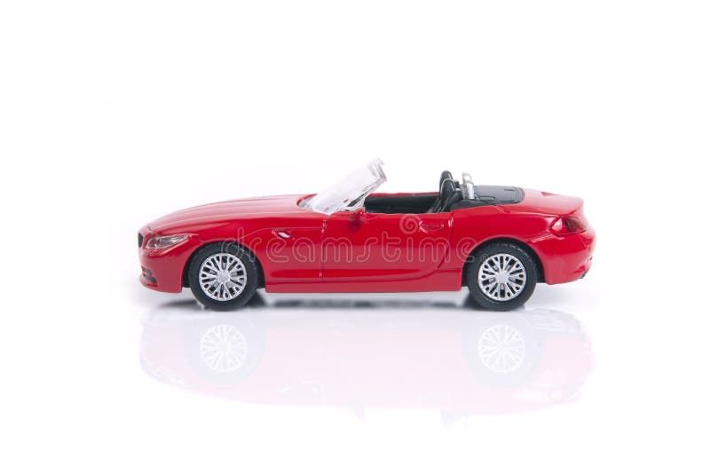 Coche Deportivo Rojo Del Juguete O Del Descapotable Del Modelo Imagen de archivo - Imagen de descapotable, deportivo: 103900153