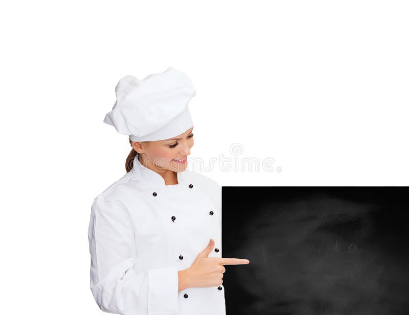 Cocinero de sexo femenino sonriente con el tablero en blanco blanco fotos de archivo Cocinero de sexo femenino sonriente con el tablero en blanco blanco fotos de archivo