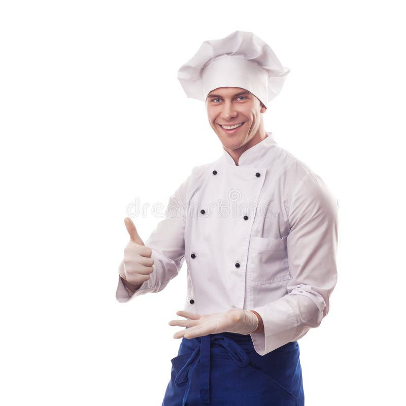 Cocinero que se coloca con los pulgares para arriba imagen de archivo Cocinero que se coloca con los pulgares para arriba imagen de archivo