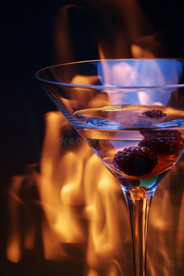 Cocktail Glass Over Fire Trace Stock Image - Image of glowing ...