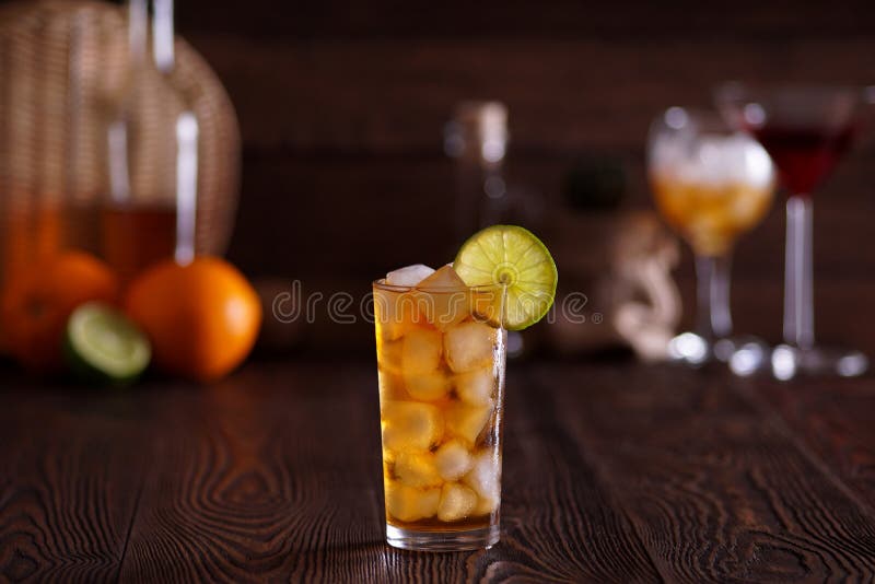 A Glass Of Long Island Iced Tea On Table Stock Photo, Picture and Royalty  Free Image. Image 115995393.