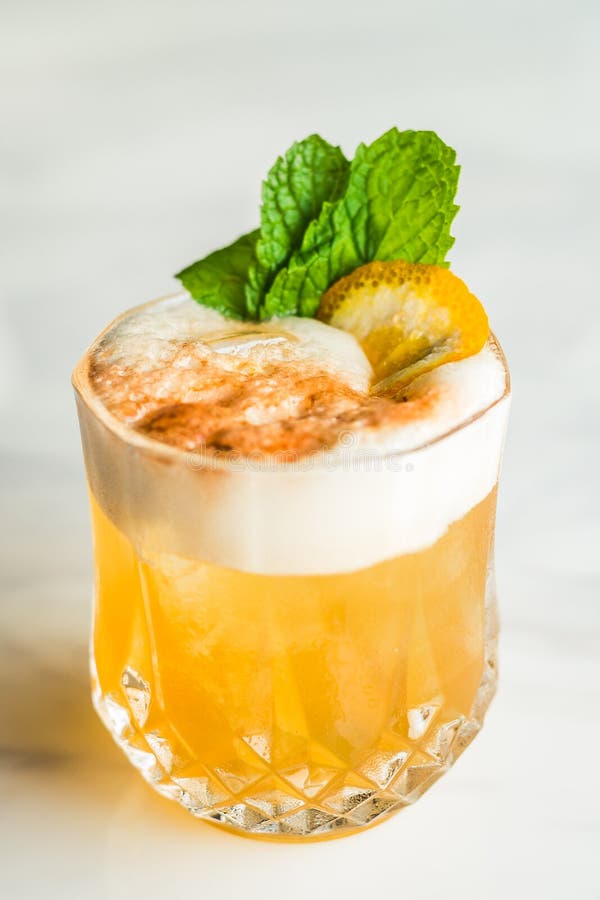 Cocktail with Orange Bitter and Orange Peel and Mint Leave Stock Image