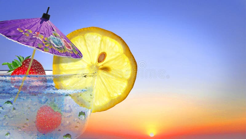 Photo of cocktail glass with summer fruits and parasol against a sunset sky ideal for own text etc. Photo of cocktail glass with summer fruits and parasol against a sunset sky ideal for own text etc.