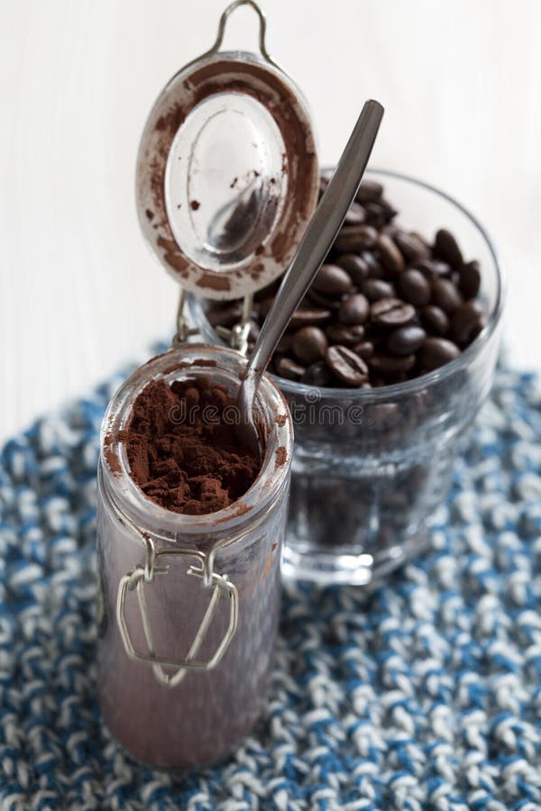 Cocoa powder in glass jar stock image. Image of powder 27634765