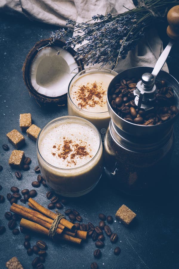 Coconut latte. Vegan coffee drink Ketogenic diet concept. Ketogenic latte with coconut . Coffee with coconut milk. Health products stock photo Coconut latte. Vegan coffee drink Ketogenic diet concept. Ketogenic latte with coconut . Coffee with coconut milk. Health products stock photo