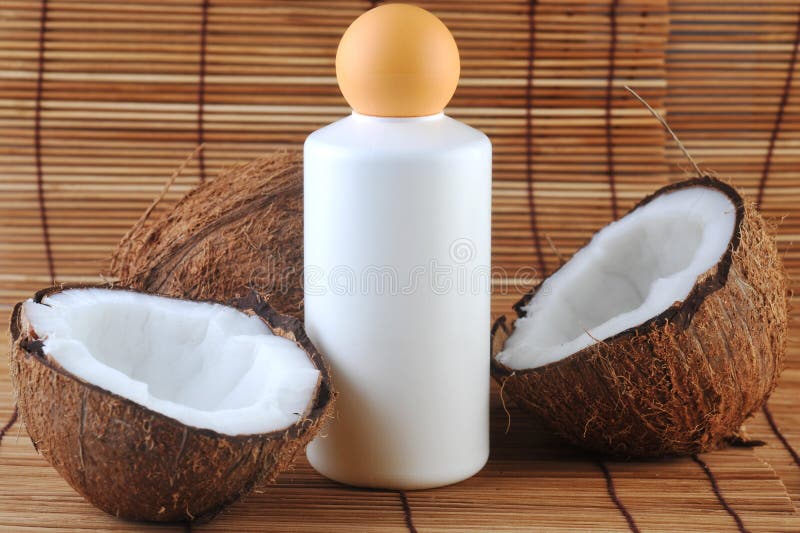 Coconut and massage oil stock image. Image of massaging 11977447