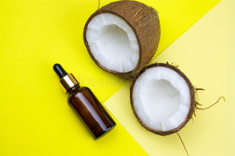 Coconut and oil bottle stock photo. Image of brown, closeup 140442664