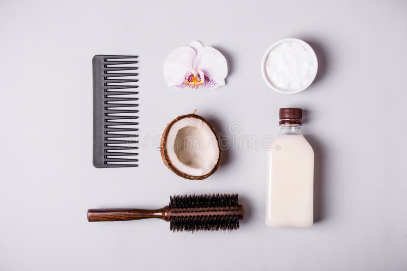 Coconut oil and and combs. Hair care concept