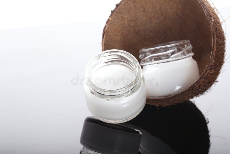 Coconut Oil with a Glass Jar is on the Table Stock Photo Image of