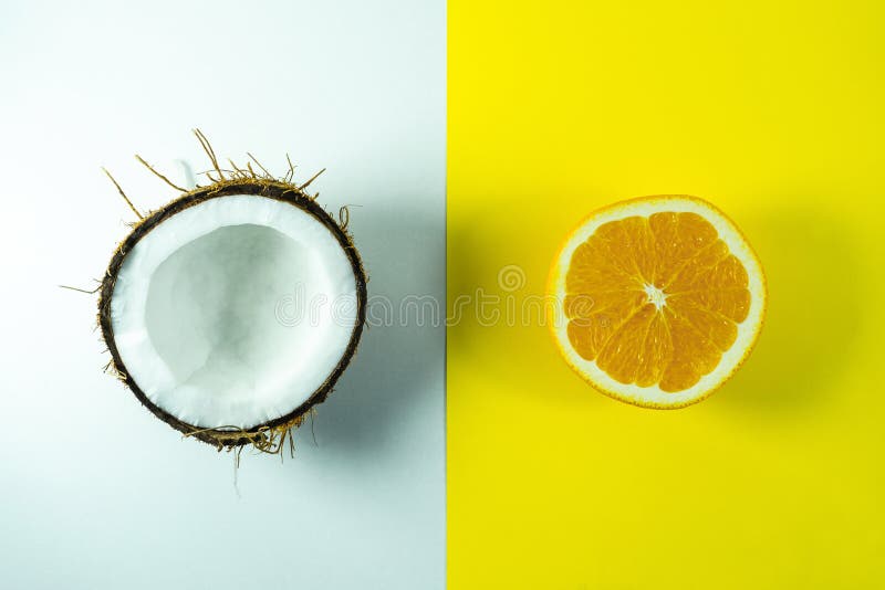 Coconut with Orange. Creative Composition of Coconut and Orange. he Was