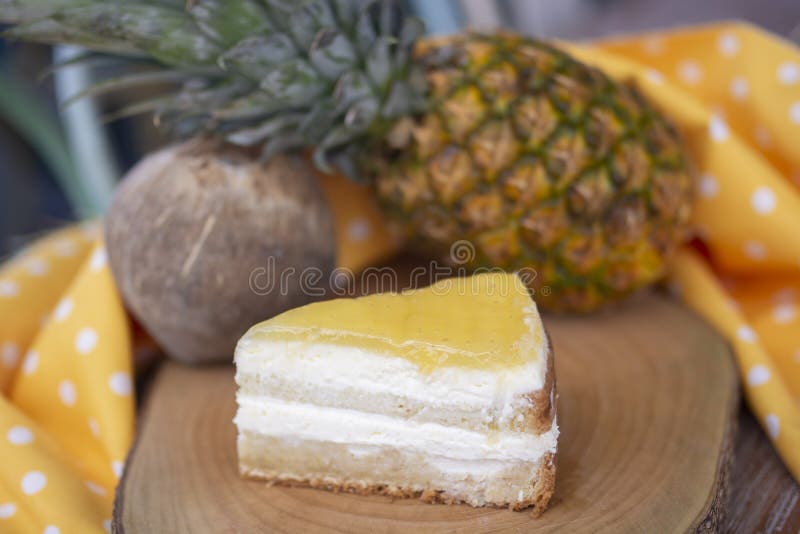Coconut and Pineapple Cake with Coconut and Pineapple Background Stock