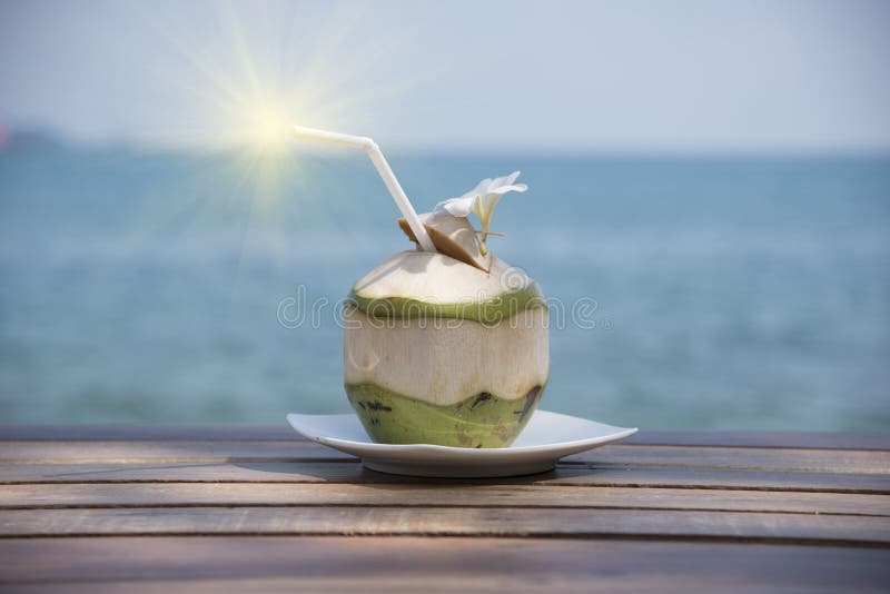Coconut placed on a wooden board royalty free stock photo