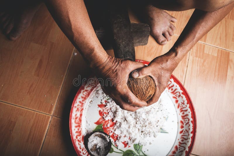 https://thumbs.dreamstime.com/b/coconut-scraping-hand-rural-thailand-style-254121677.jpg