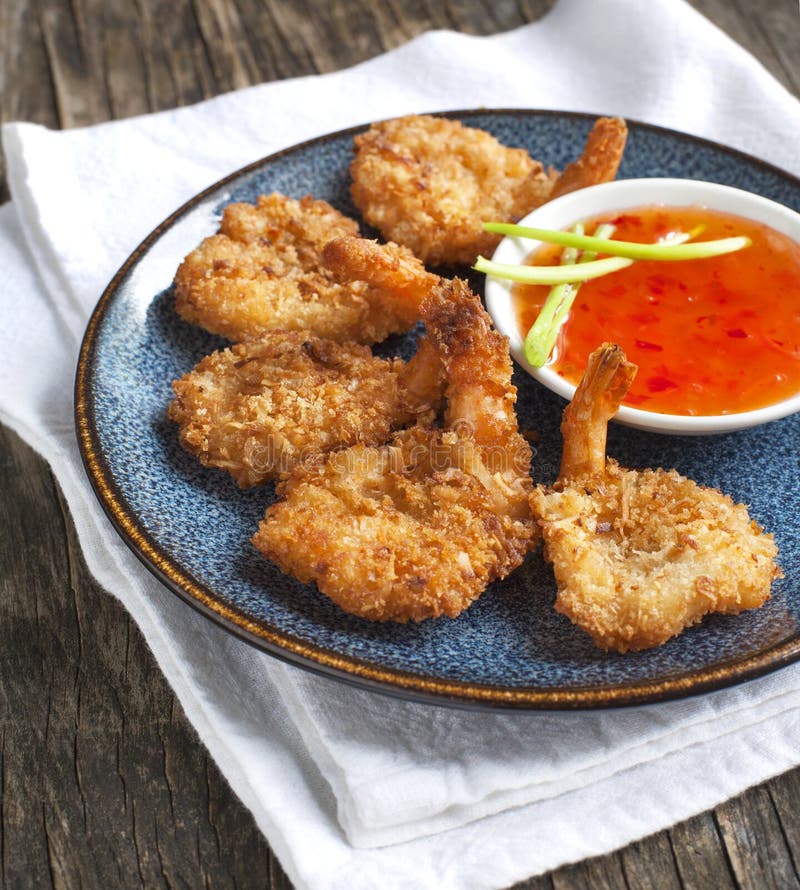 Coconut shrimp. Butterfly shrimp in a crunchy coating royalty free stock photo