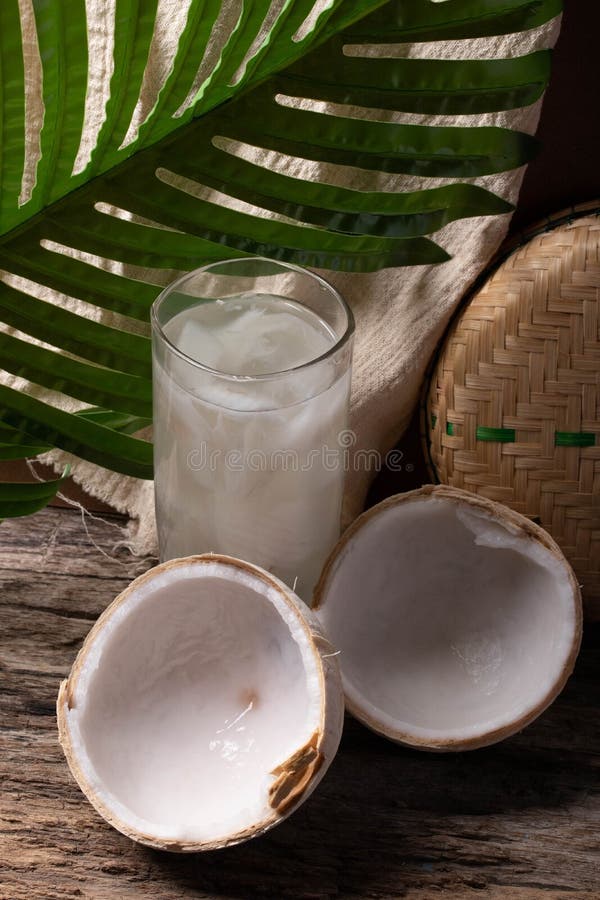 Coconut Water in a Glass and Young Coconut Stock Image Image of
