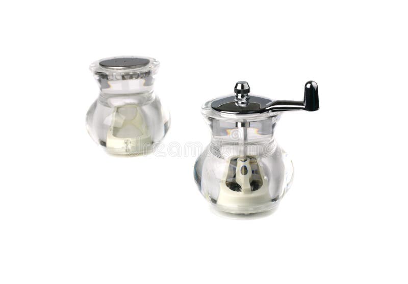 Coctelera de sal de cristal y de pimienta imagen de archivo libre de regalías Coctelera de sal de cristal y de pimienta imagen de archivo libre de regalías