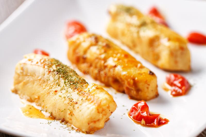 Cod Fillet with Aromatic Herbs royalty free stock photos