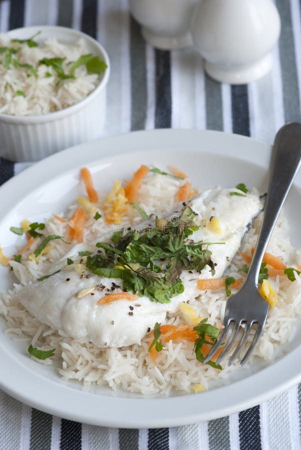 Cod with rice stock photo. Image of prepared, coriander 18961386