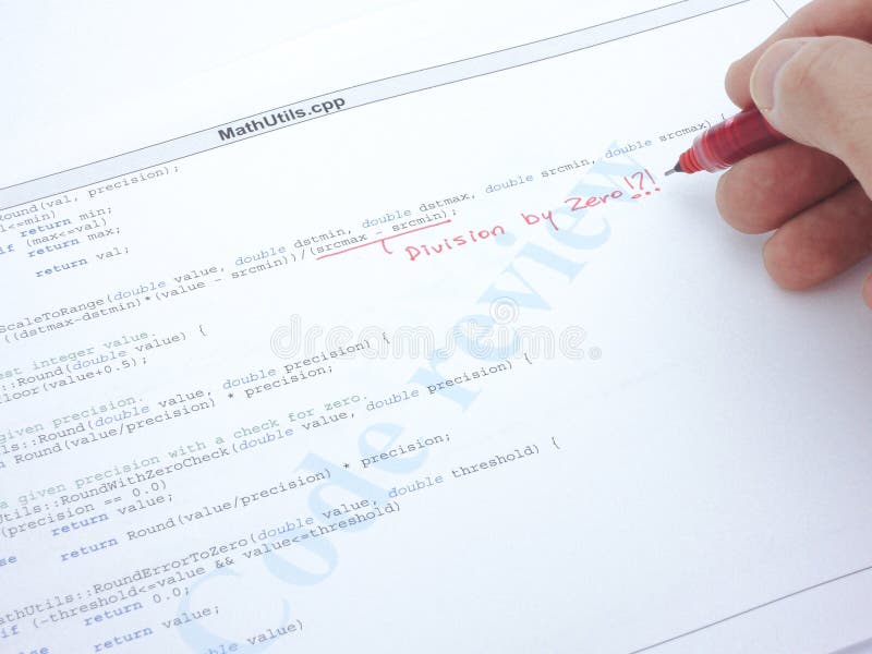 Code review of a C++ program. A division by zero error is found. Code division stock images, royalty-free photos and pictures