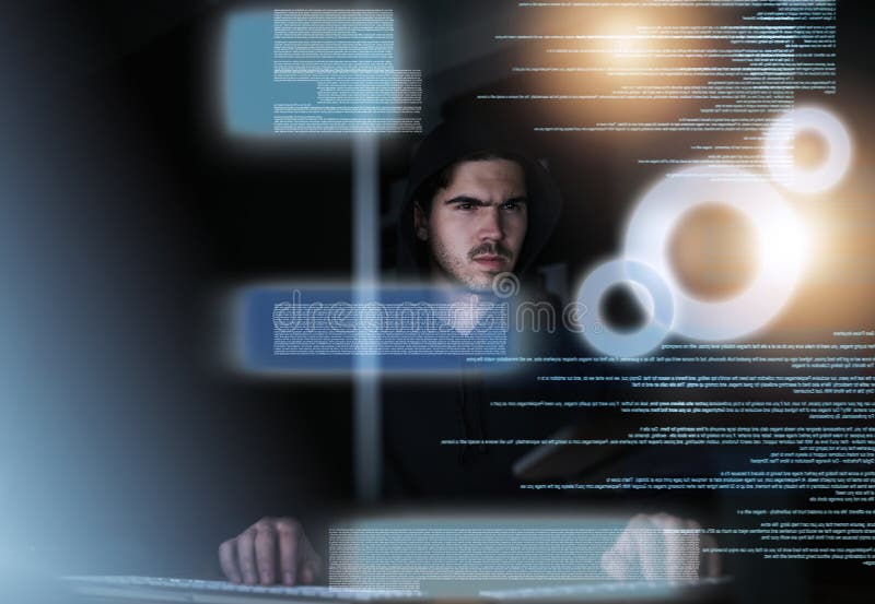 Coding requires razor-sharp focus. a focussed young computer programmer working on his coding late at night. stock image