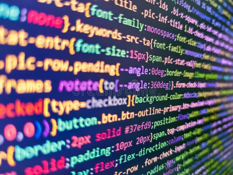 Coding Script Text on Screen. Blurred Screen with Selective Focus Stock