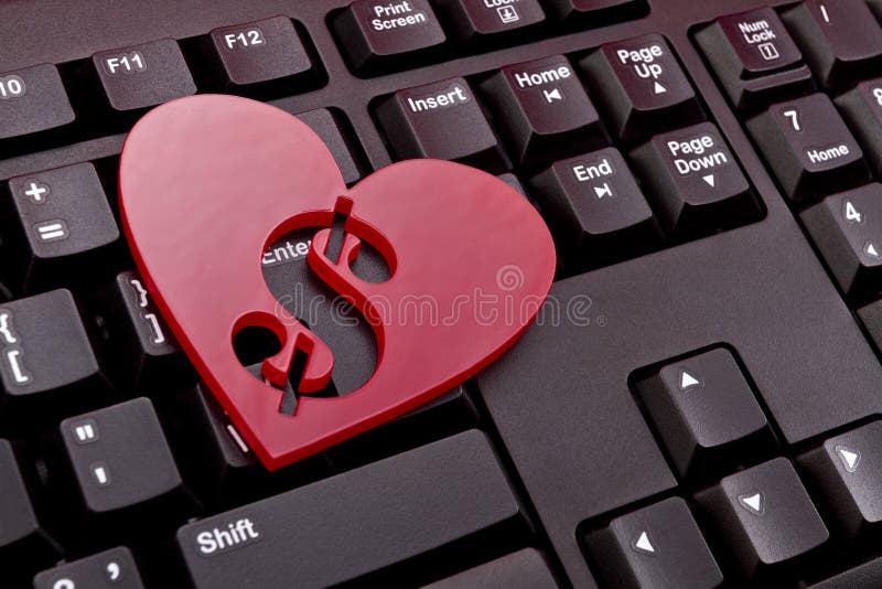 Coeur rouge avec un symbole dollar images libres de droits Coeur rouge avec un symbole dollar images libres de droits