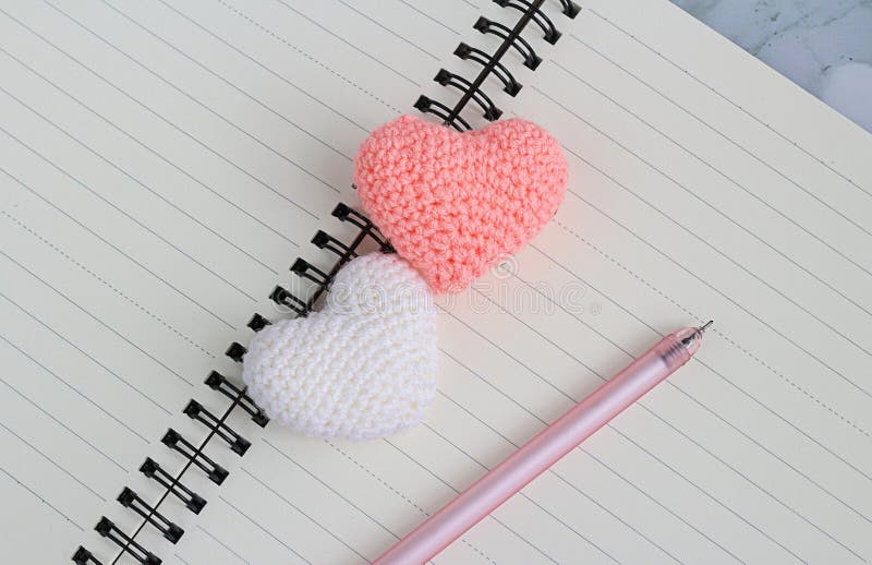 2 crochet hearts placed on the of notebooks, diaries. 2 crochet hearts placed on the of notebooks, diaries.