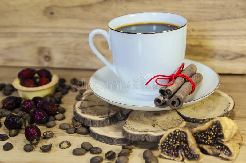 Coffe with fig, cup and coffee beans. Coffe with fig, cup and coffee beans