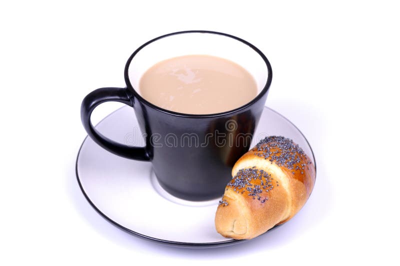Coffe with milk and croissant