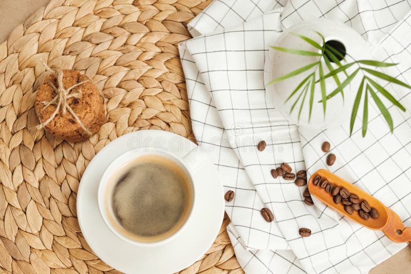 Coffee with American cookies tied with twine. coffee beans are scattered nearby royalty free stock photo Coffee with American cookies tied with twine. coffee beans are scattered nearby royalty free stock photo