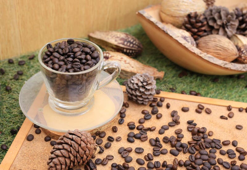 Coffee Background with a Decorative. Cup with Coffee Beans Stock Photo