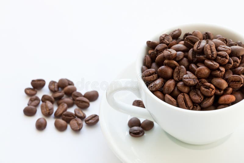 Coffee beans and coffee cup