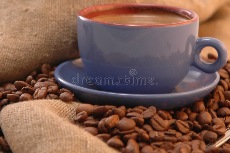 Coffee beans, and cup