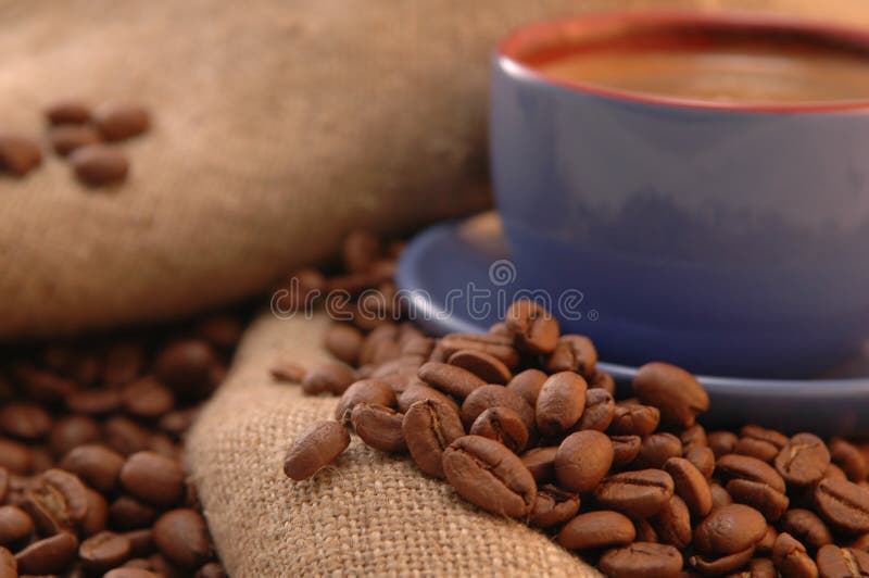 Coffee beans, and cup