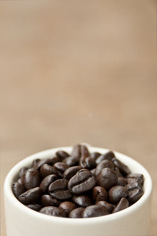 Coffee beans in cup stock image. Image of caffeine, beverage 45782125