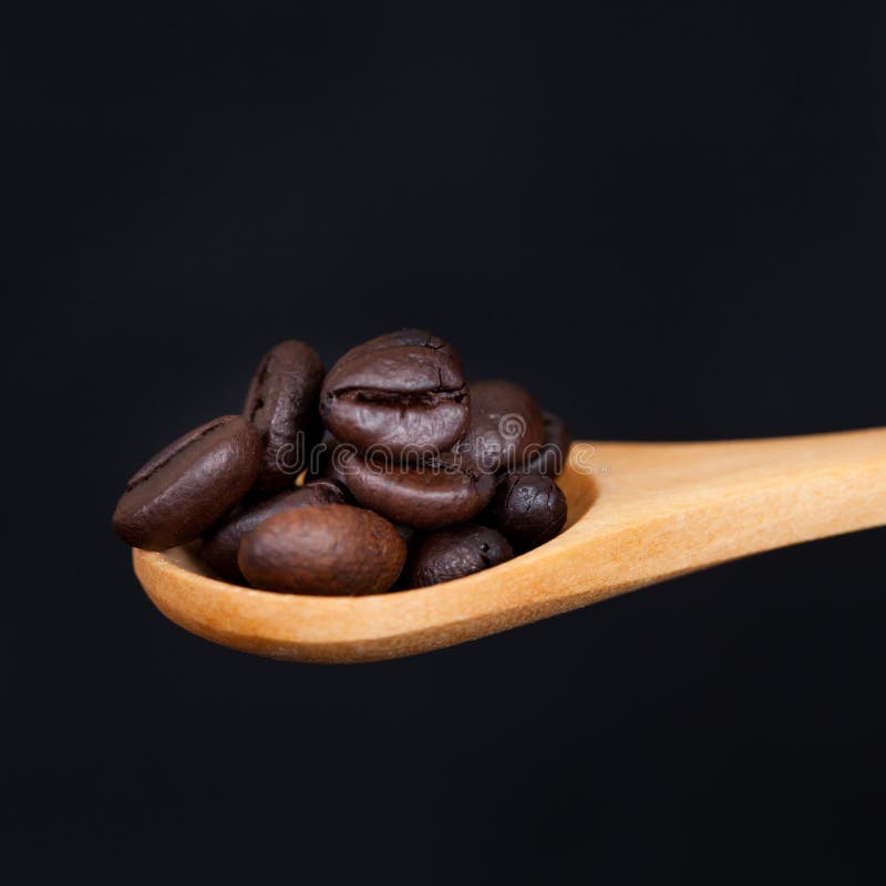 Coffee beans in a spoon stock photo. Image of copy, dark 71606458