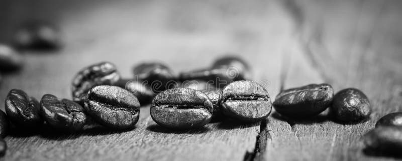 Coffee Beans texture on black and white on the wood background